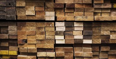 small-pile-wood-background-370x190