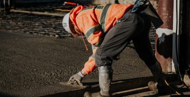 workers-construction-site-370x190