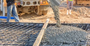 concrete-pouring-during-commercial-concreting-floors-buildings-construction-site-370x190