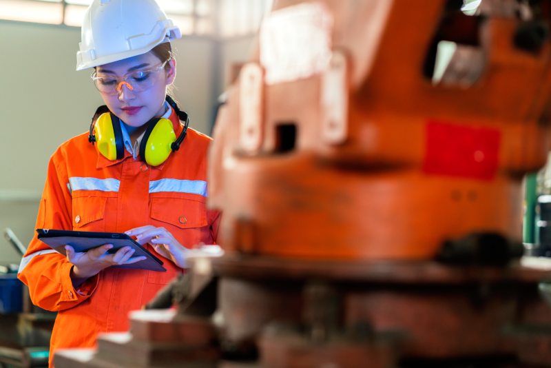 A construction worker wearing an IoT helmet